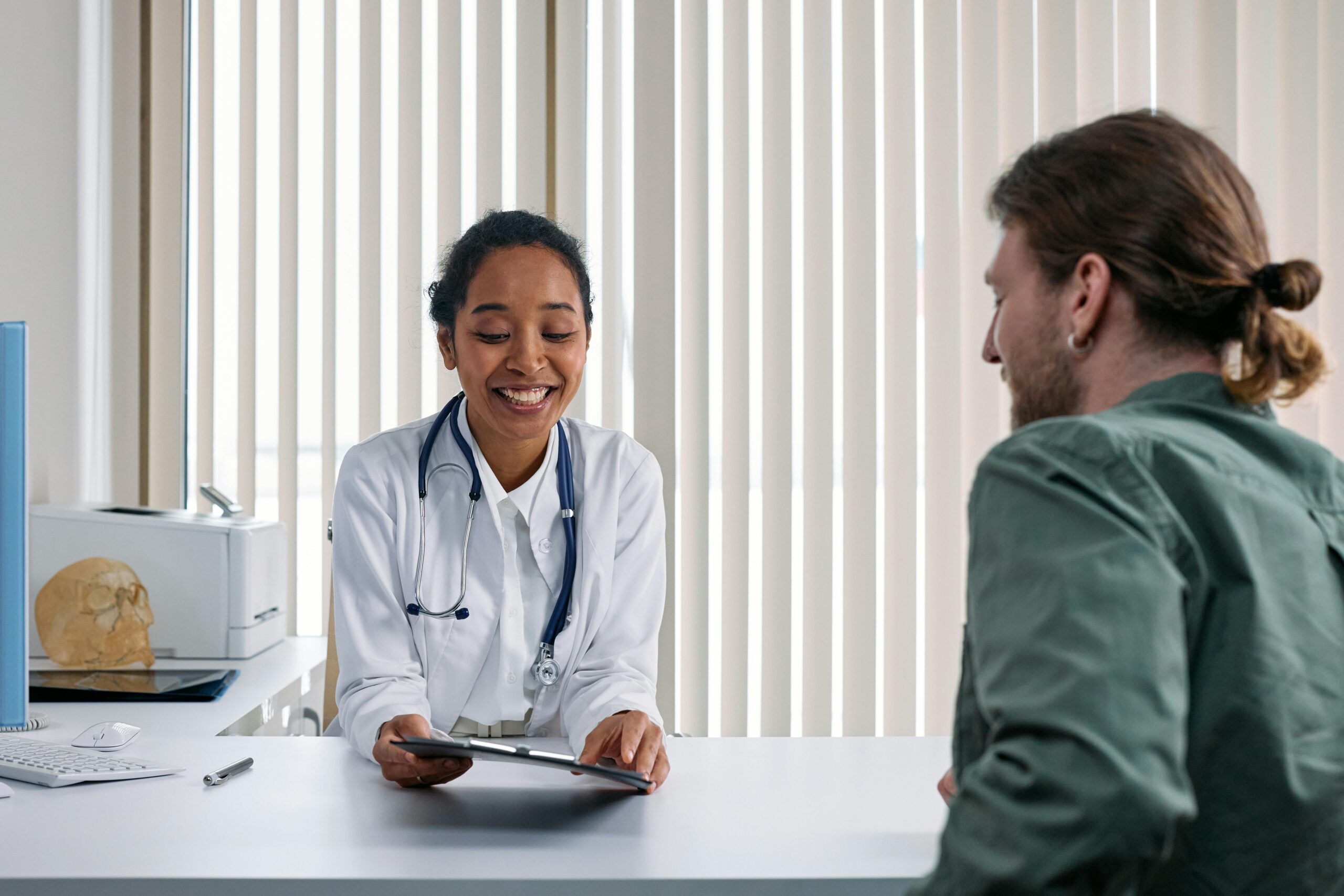 A patient speaking to a doctor